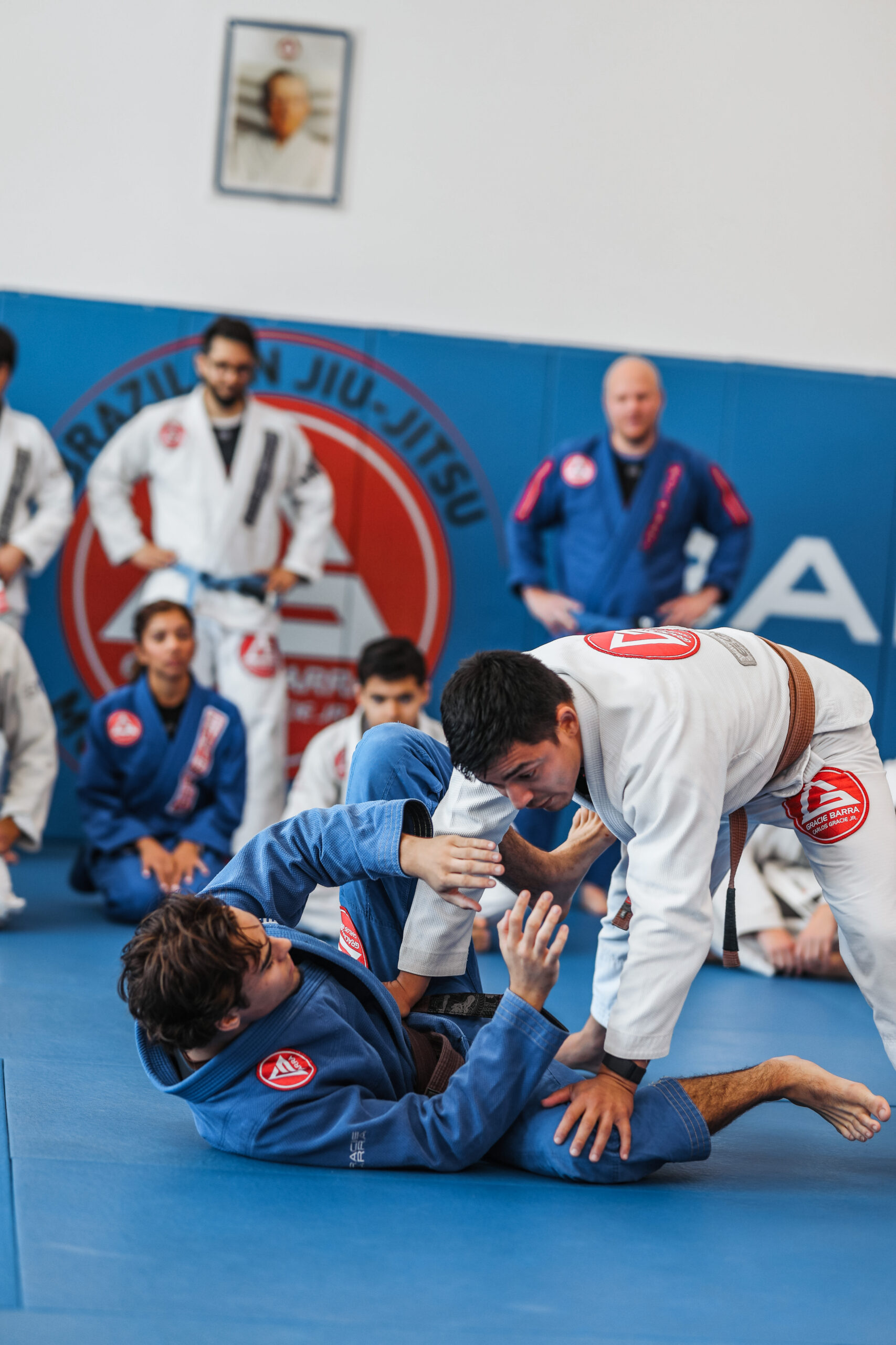 Jiu-Jitsu students working on technique together